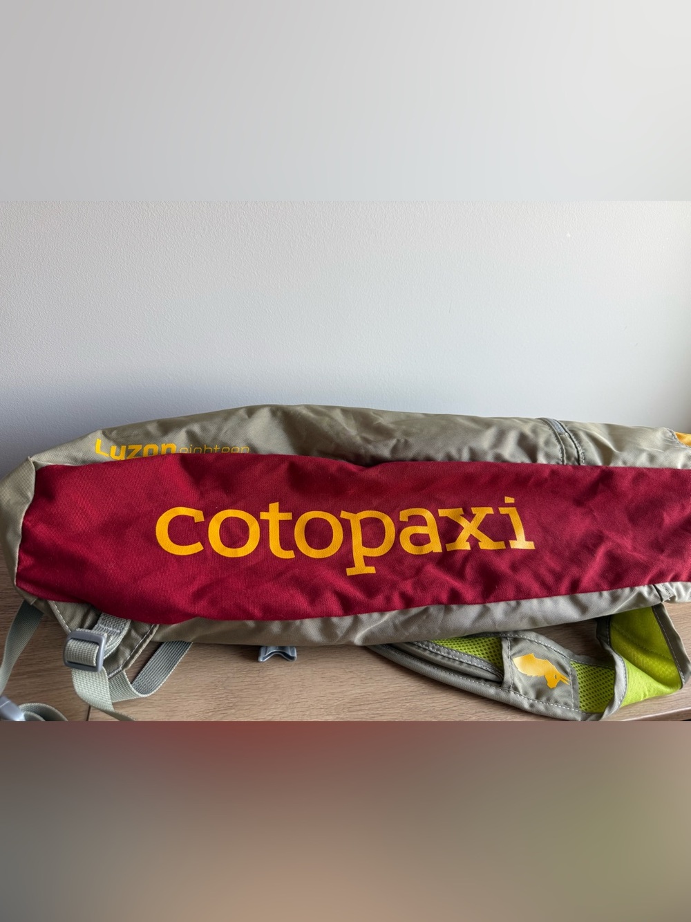 cotopaxi Maroon and Yellow Logo Daypack